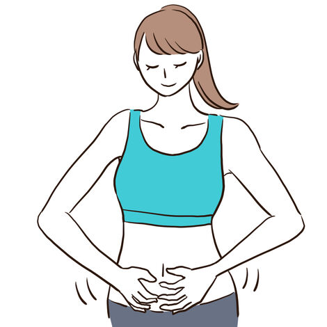 お腹を気にする女性のイラスト